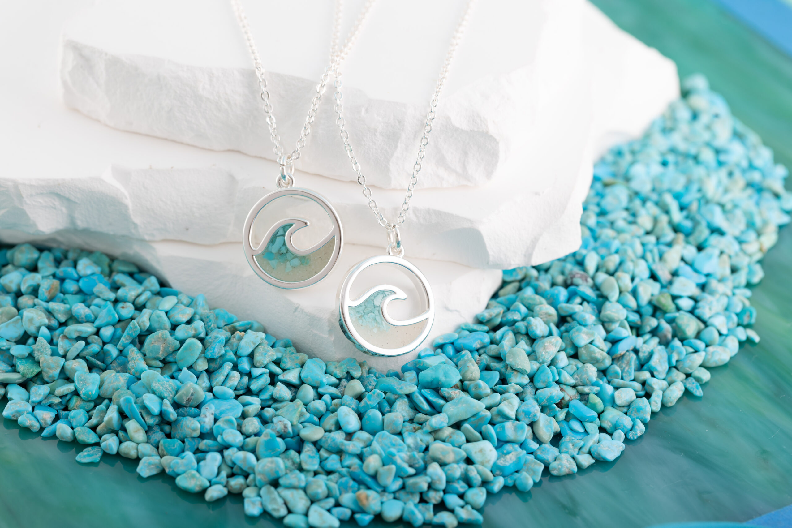 Product shot of the Cresting Wave Necklace, which comes as a free gift for those who purchase select items during giving week.