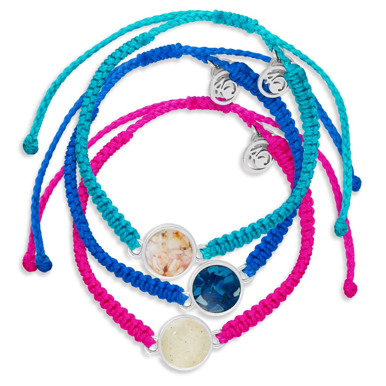 Product shot of the Dune x 4ocean Calypso bracelet set with woven polymer in pink, blue, and teal and recycled plastic-filled circular pendants.
