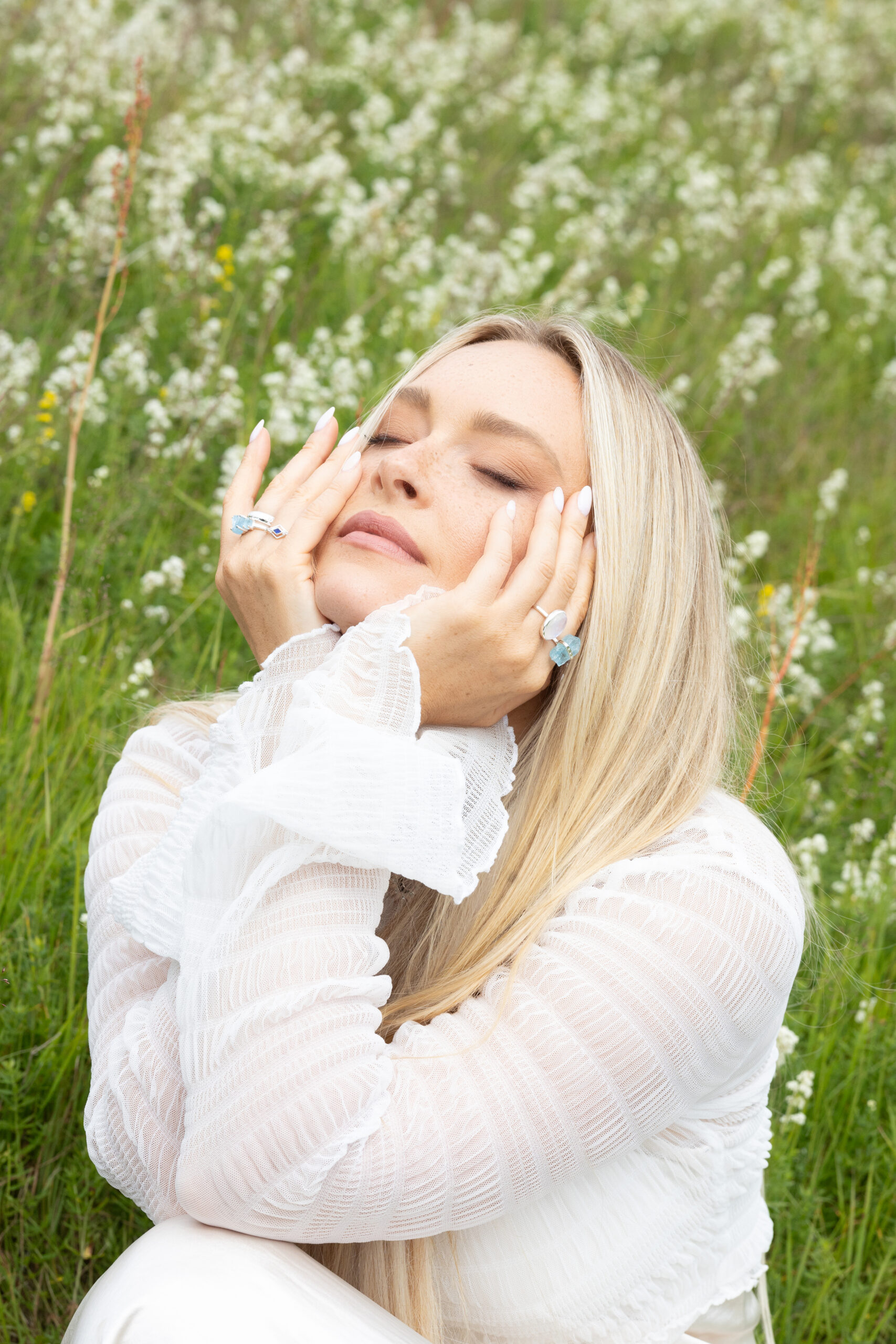 Camille Kostek Sports Illustrated Swimsuit Model wearing Dune Jewelry in Iceland.