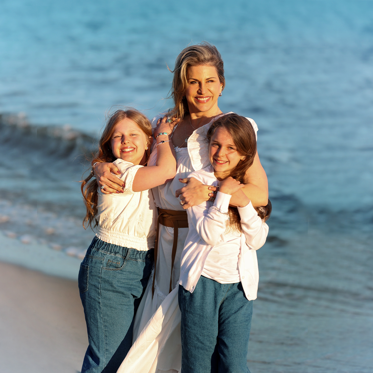 Holly, Dune Jewelry's founder, and her daughters in Cape Cod.