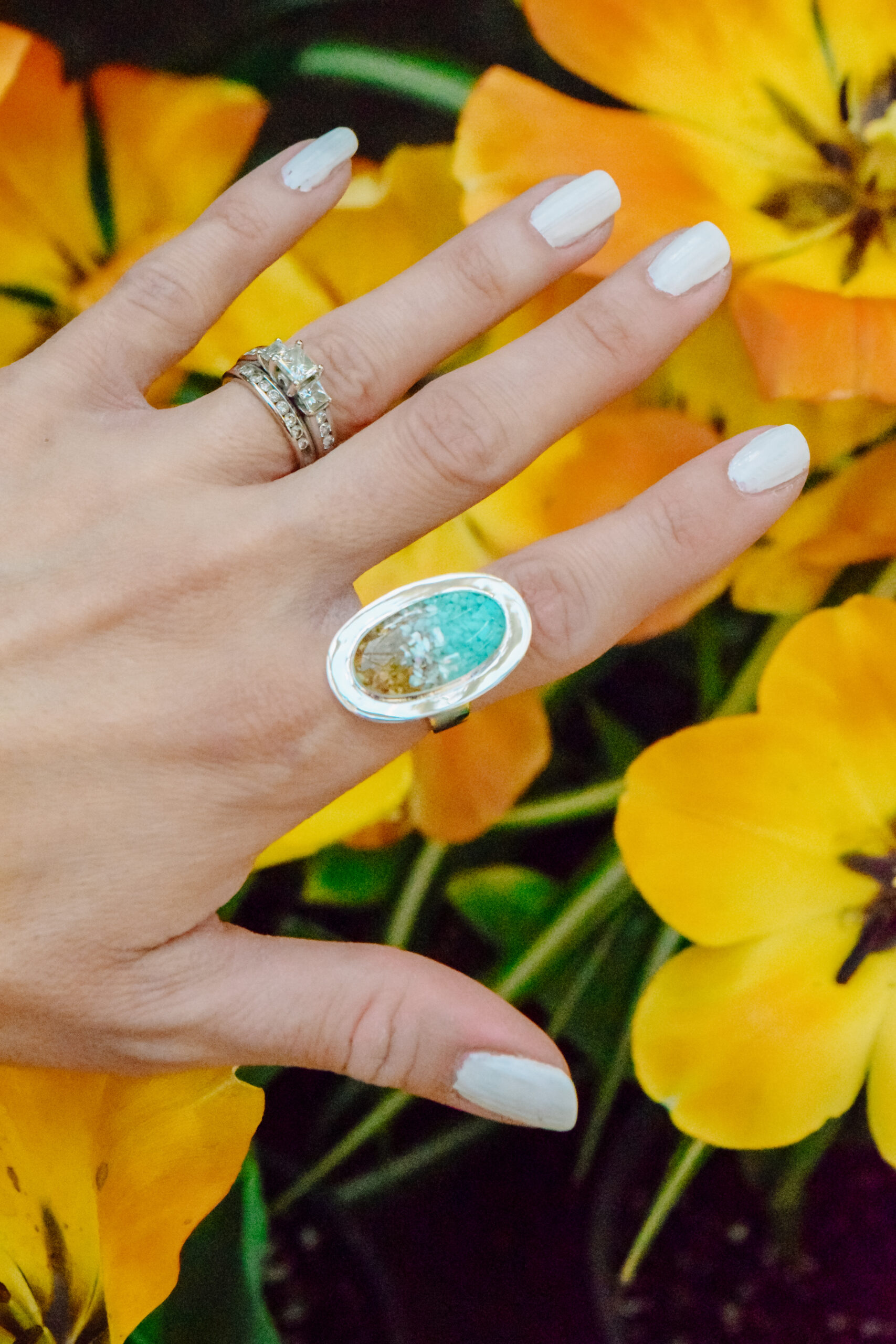 Influencer's shot of her Cocktail Ring Ocean Gradient for Dune Jewelry's Mother's Day Campaign.