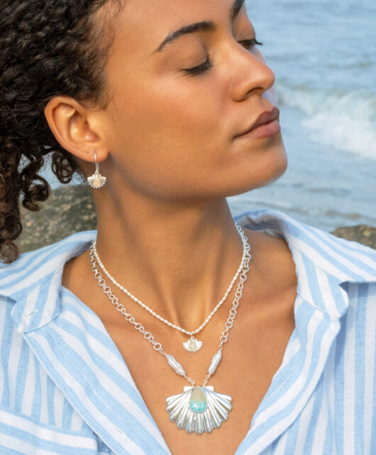 Summer trend alert: summer jewelry trends include Coastal Shell Necklaces with baroque pearls, turquoise ocean gradients, sterling silver and your choice of sand or earth element.