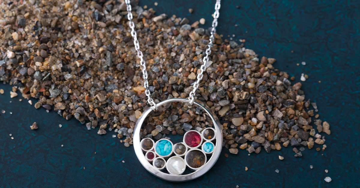The multi-element Bubbles Necklace, a personalized sterling silver bubble design that allows you to pick any 10 elements.