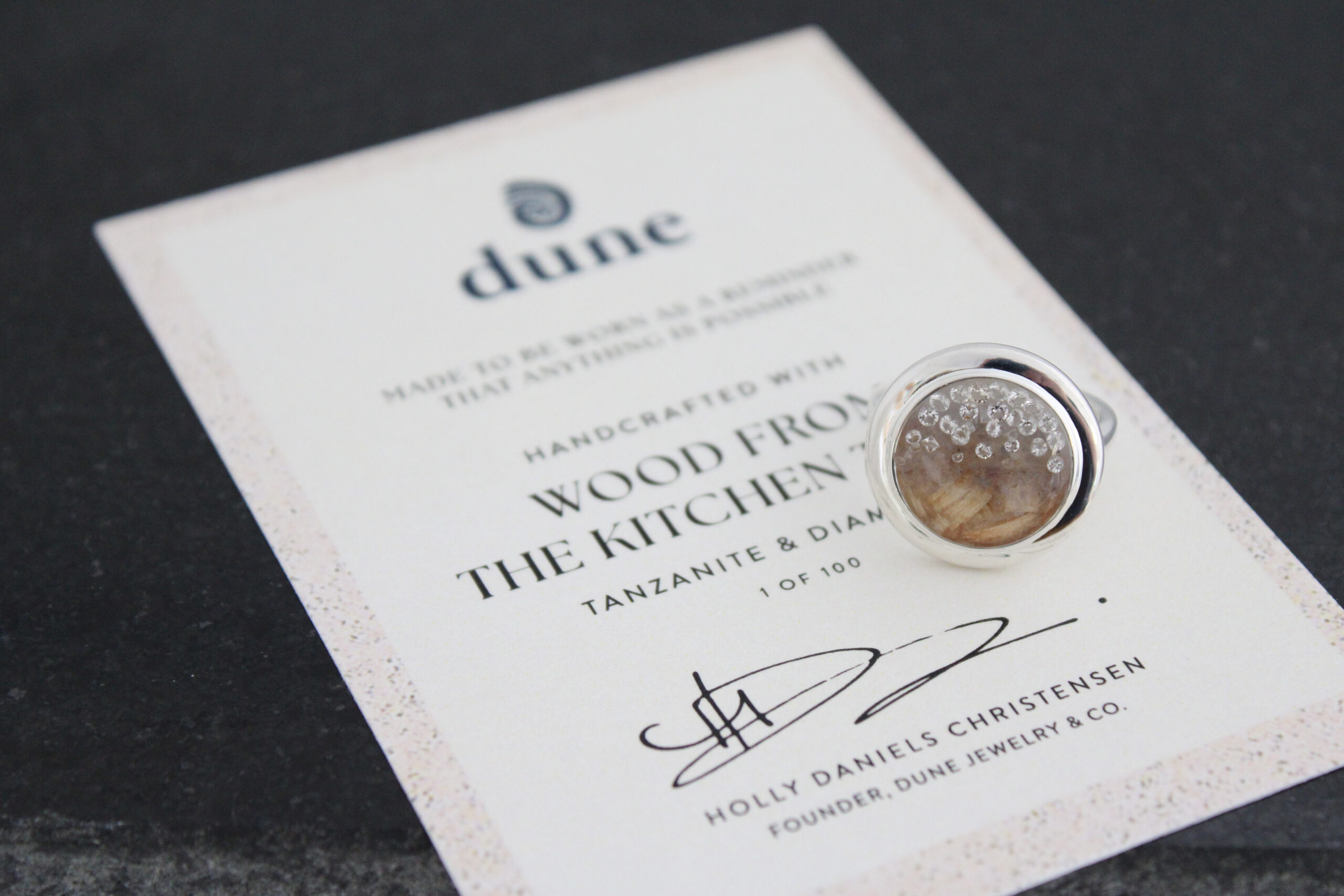 The Founder's Ring, with real fragments of wood from my kitchen table where it all began.