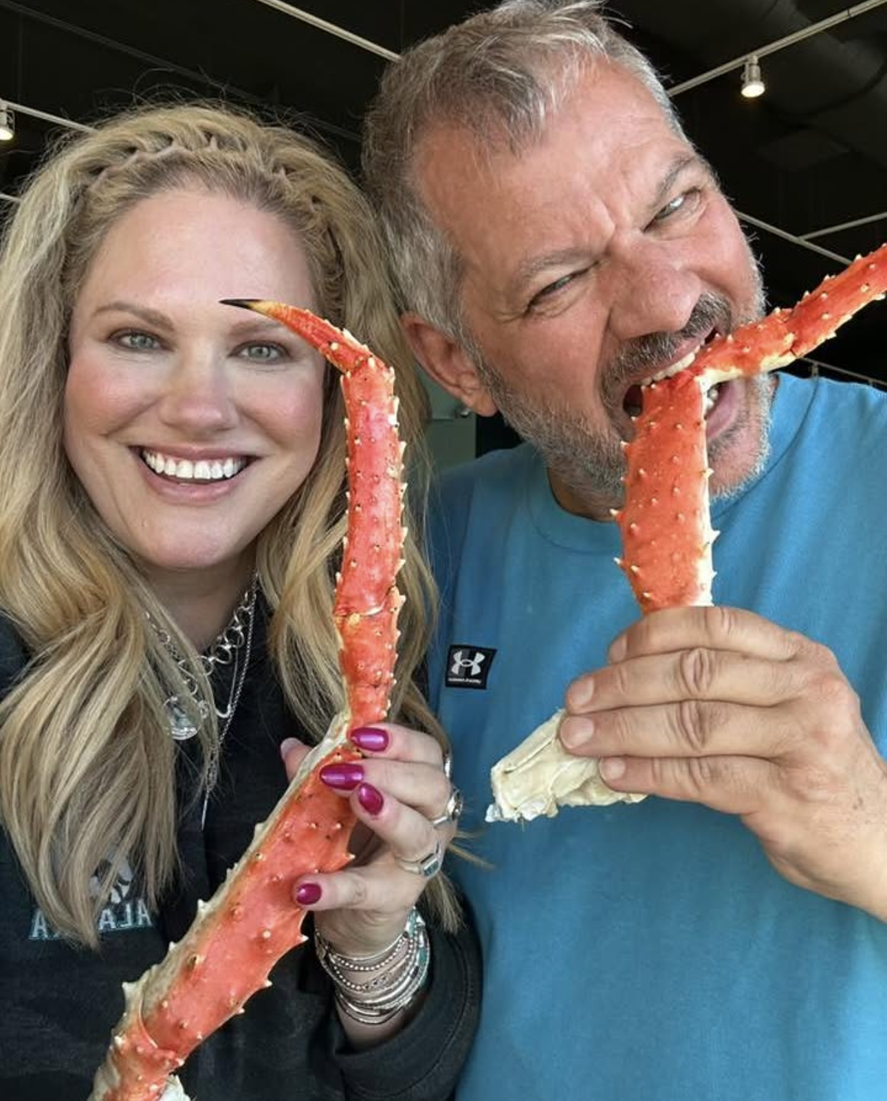 Alaska-inspired jewelry, travel jewelry and nature-inspired jewelry in Alaska. Travel guide to Alaska, group cruise trips with Dune Travels cruise, Christine Kesteloo and husband Piet eating King Crab legs at the beloved Alaska Fish House in Ketchikan, Alaska.