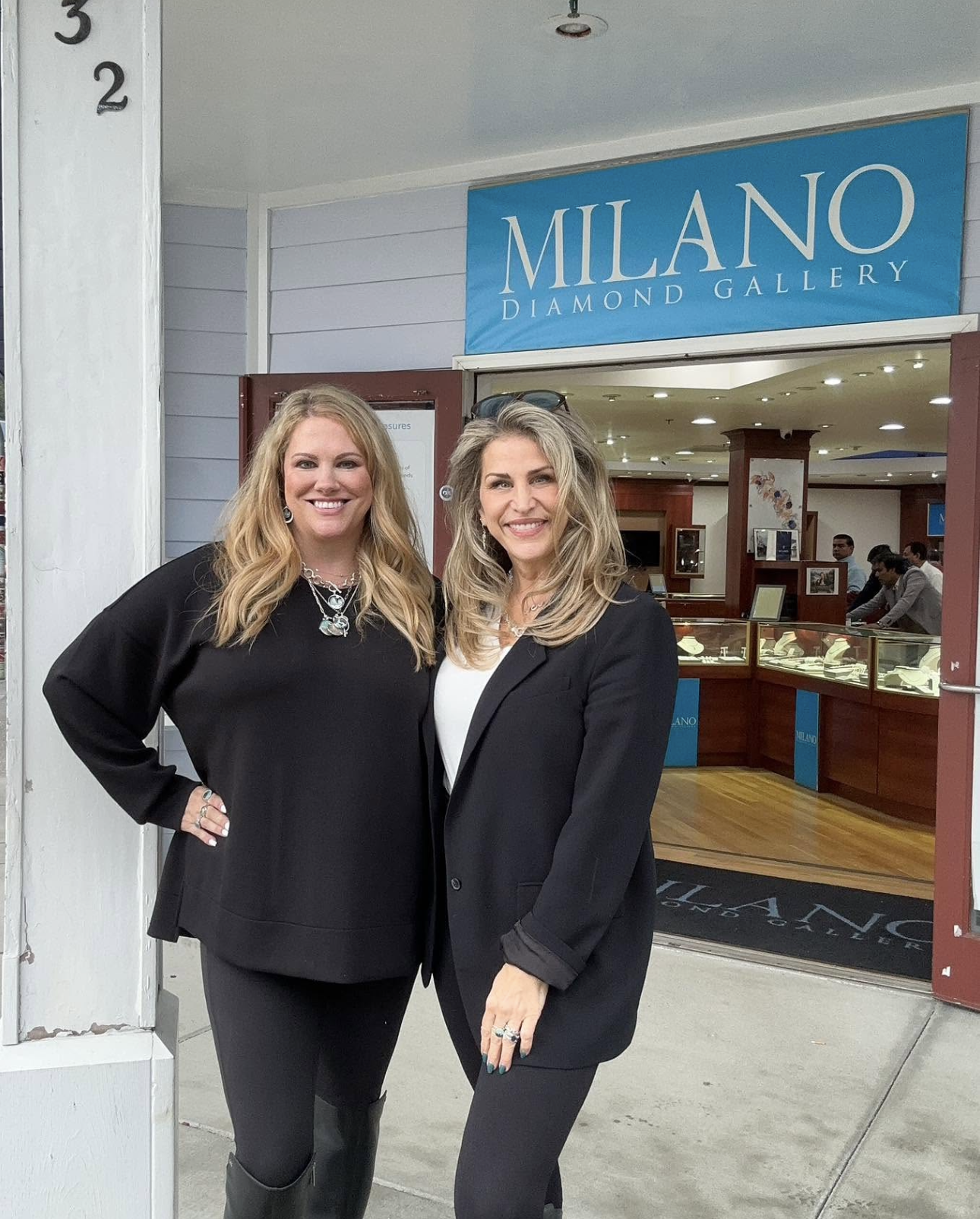 Holly Daniels Christensen, Dune jewelry Founder & Designer, with collaborator Christine Kesteloo in front of the Milan Diamond Gallery shop in Alaska. Alaska-inspired jewelry, travel jewelry and nature-inspired jewelry in Alaska. Travel guide to Alaska, group cruise trips with Dune Travels cruise, Christine Kesteloo and husband Piet eating King Crab legs at the beloved Alaska Fish House in Ketchikan, Alaska.