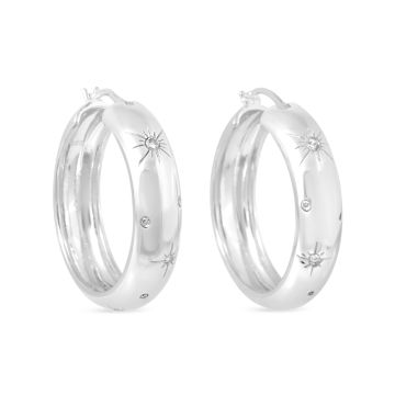 Large size sterling silver and cultured diamond hoop earrings inspired by the stars and the galaxy. Designed with Camille Kostek. 