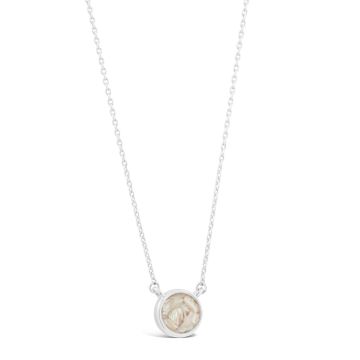 Dainty birth month jewelry featuring a round design with Baby's Ear Shell and a cable chain necklace. Perfect October birthday gift or holiday gift.