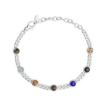 Sterling silver cuban chain bracelet with seven customizable sand and earth element settings, inspired by travel memories made in every continent.
