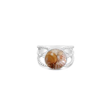 Round boho ring with three detailed rings, featuring shell fragments in a domed, glass-like finish, embodying coastal bohemian style.