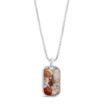Sterling Travel Tag Necklace with a bold silver pendant containing ethically sourced shells, symbolizing a love for travel and coastal memories.