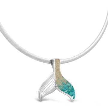 Sterling silver ocean-inspired necklace with an omega or cable chain, blue whale pendant, turquoise gradient, and sand and earth elements.