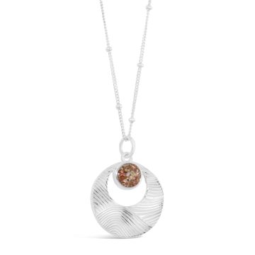 Sterling silver necklace with wave-inspired textured silver and a round element setting hanging from a beaded cable chain.