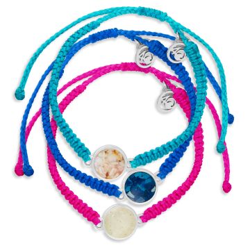 Set of three bracelets made with hand-wrapped plastic cord and a circular pendant made with earth elements and stainless steel. Bracelets are teal, blue, and pink.