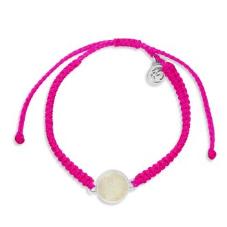 Pink bracelet made with hand-wrapped plastic cord and a circular pendant made with earth elements and stainless steel.