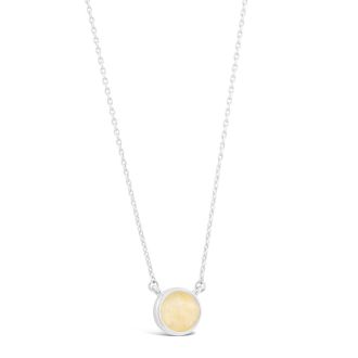 Delicate round necklace, birth month jewelry, featuring December shell Yellow Jingle Shell.