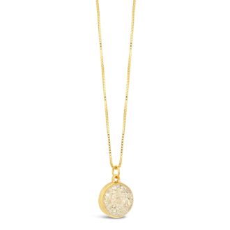 Montego Bay, Jamaica | Gold Sandglobe Necklace. Coastal gold round necklace custom crafted with beach sand and elements. Luxury personalized housewarming gifts. What is the best jewelry for a beach wedding? This is.