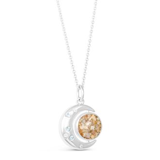 Sterling silver crescent moon necklace with aquamarine, sand or elements, and an adjustable cable chain. 
