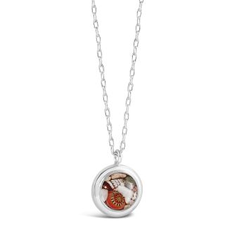 Nautical necklace by Dune Jewelry in sterling silver with natural crushed shell fragments. Features a round setting and adjustable chain.