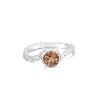 Sterling silver ring with a wave texture and a small round sand setting.