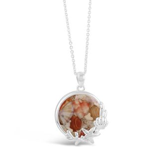 Seaside pendant design with starfish, coral, and shell details, inspired by ocean views and crafted with hand-selected shells.