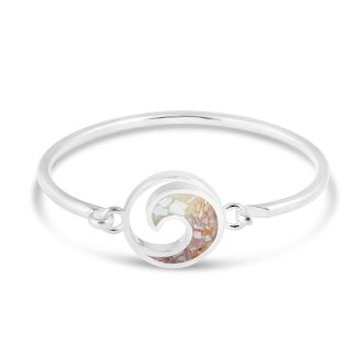 Nautical bracelet handcrafted with sterling silver featuring an ocean wave, mother of pearl, and your choice of sand or element. Great simple yet elegant jewelry design for ocean aficionados and beach lovers.