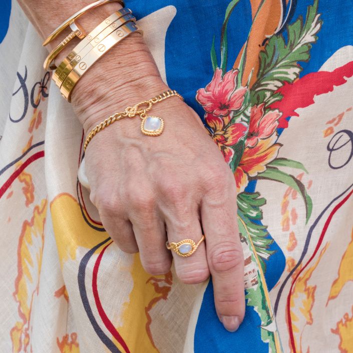 Sterling silver and gold vermeil Mariner’s Moonstone design featuring a radiant rainbow moonstone bracelet in a nautical knot design, the perfect nautical jewelry for women, for ocean-inspired elegance.