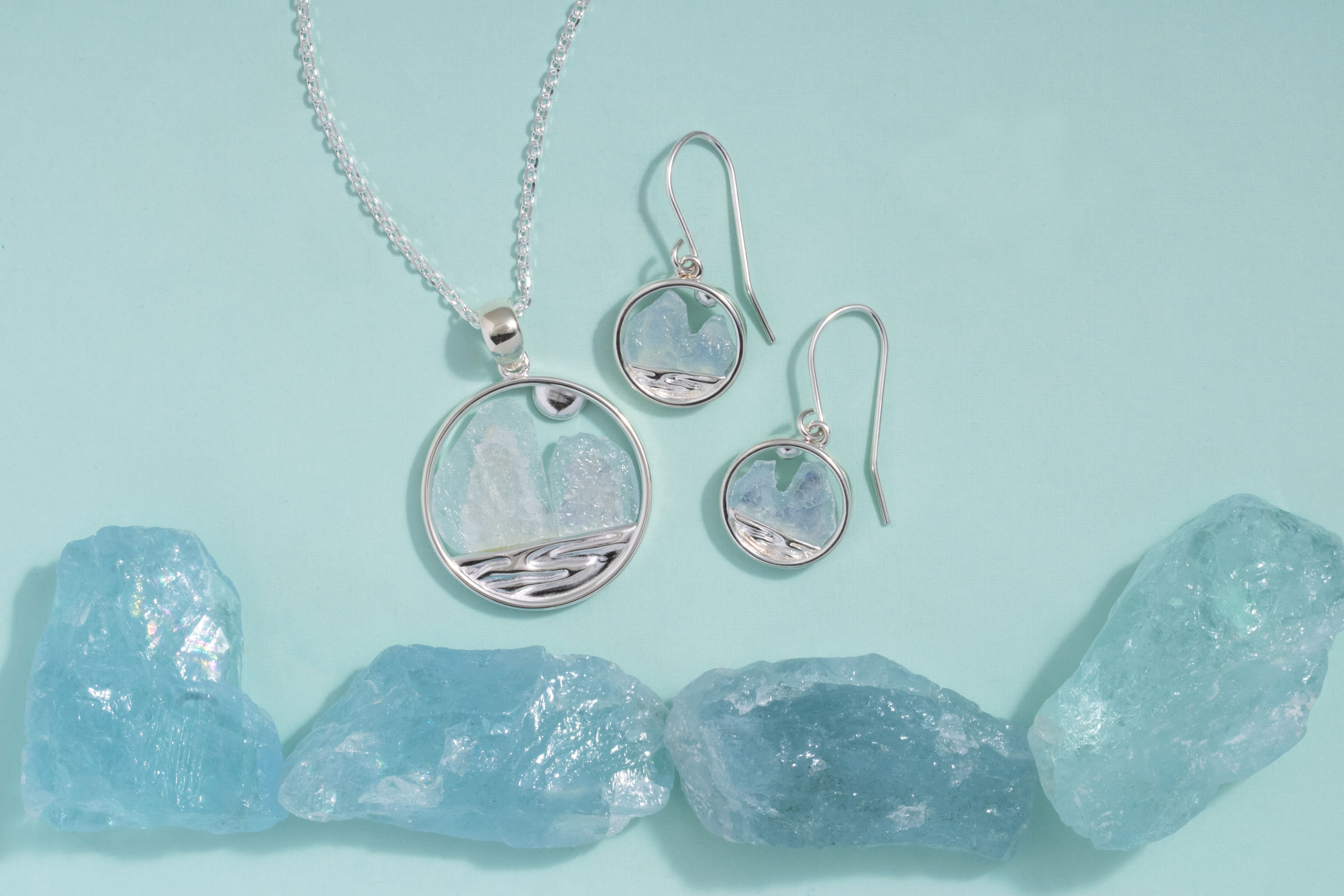 Aquamarine Glacier Gem Earrings and aquamarine necklace in sterling silver inspired by glacier ice, ocean waves, and Alaska&rsquo;s northern landscapes.