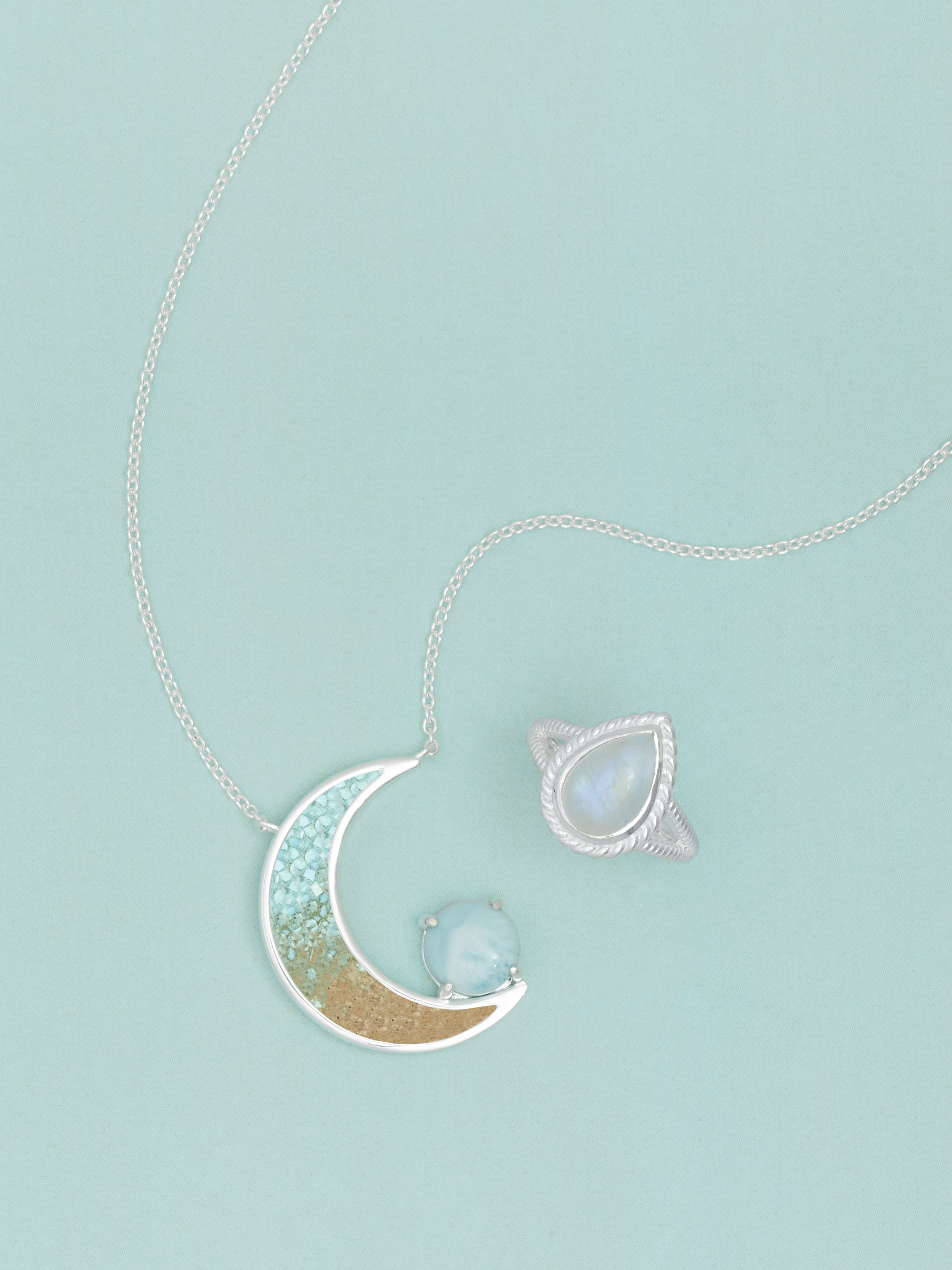 Custom jewelry personalized with sand from Dune Jewelry's Sandbank of more than 5,500 locations during the Bon Voyage Event. Affordable jewelry.