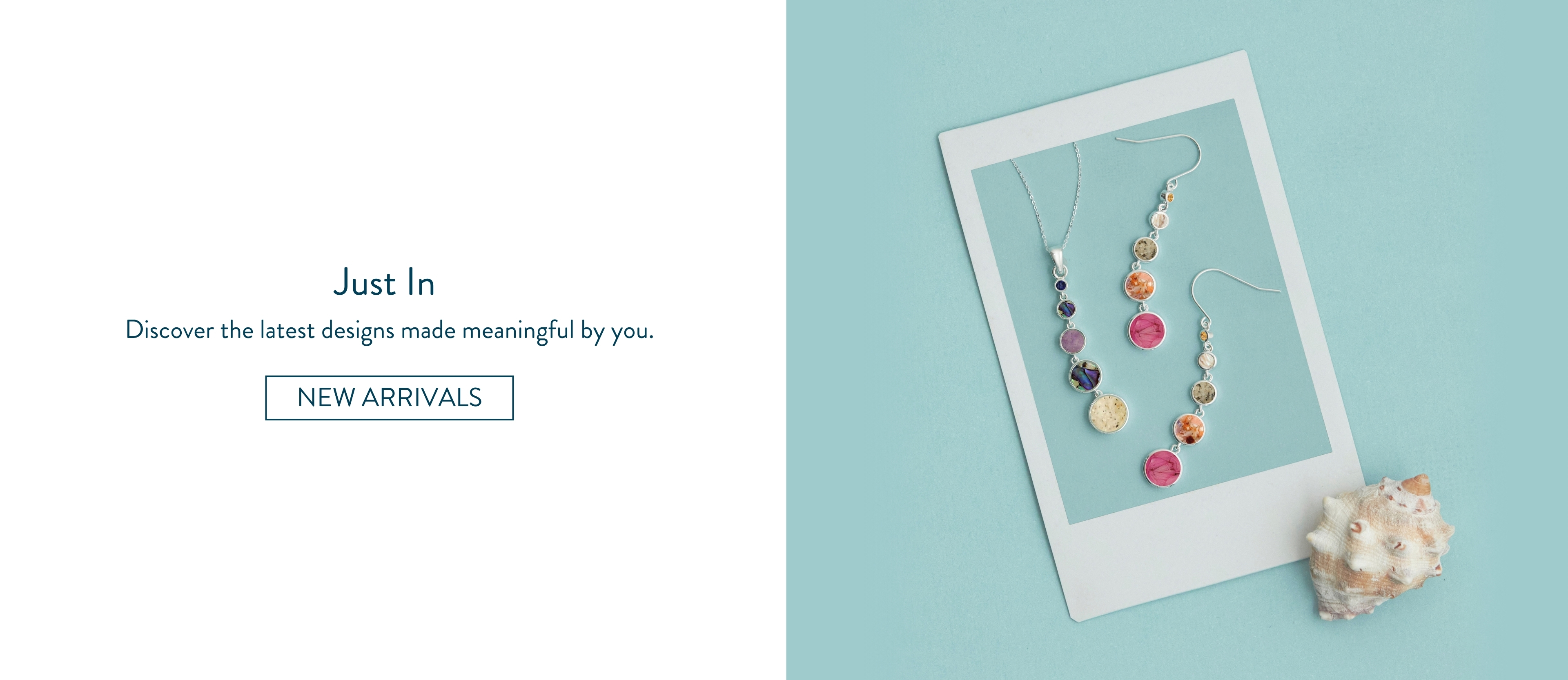 Woman wearing customizable silver stacker rings with colorful sand, birthstone and earth elements. Monthly jewelry deals and discounts.