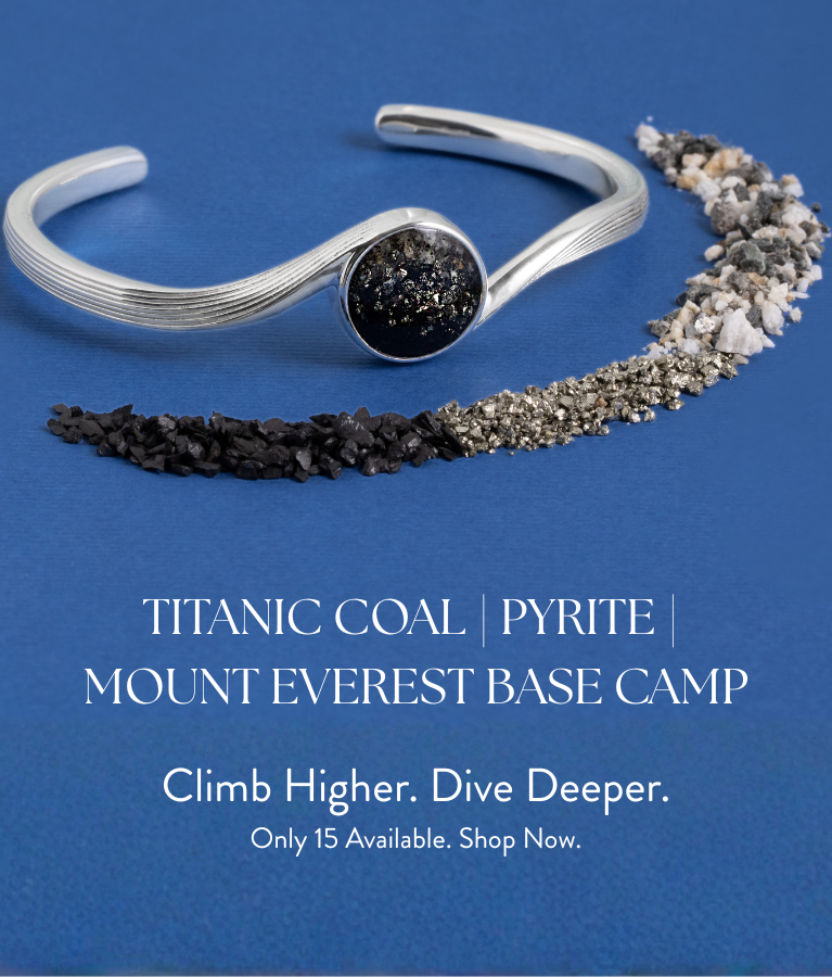 Masterpiece Collection, handcrafted sterling silver sun necklace with Bali sand, diamonds that mirror the planets, gold flakes, and lapis lazuli.