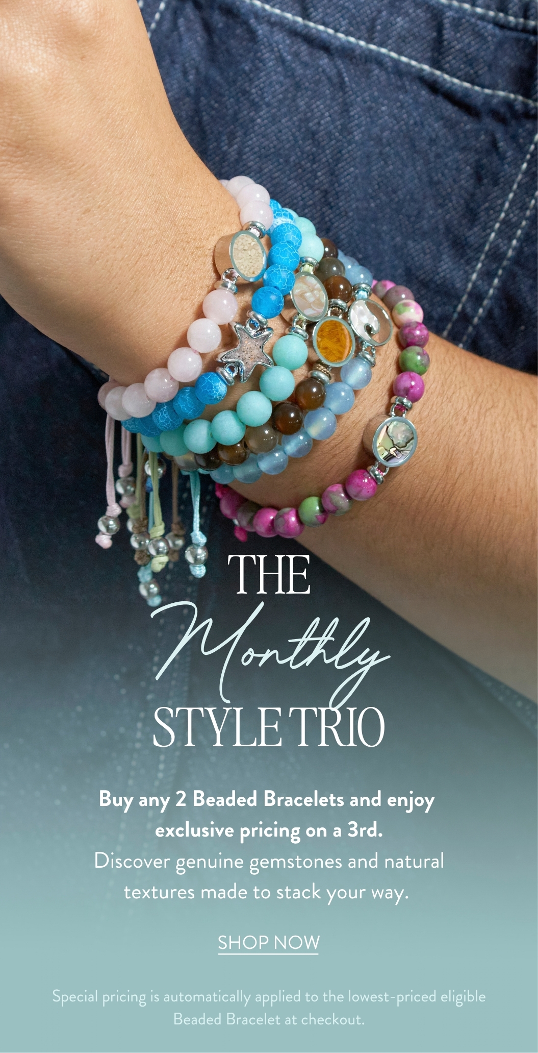 Woman wearing customizable silver stacker rings with colorful sand, birthstone and earth elements. Monthly jewelry deals and discounts.