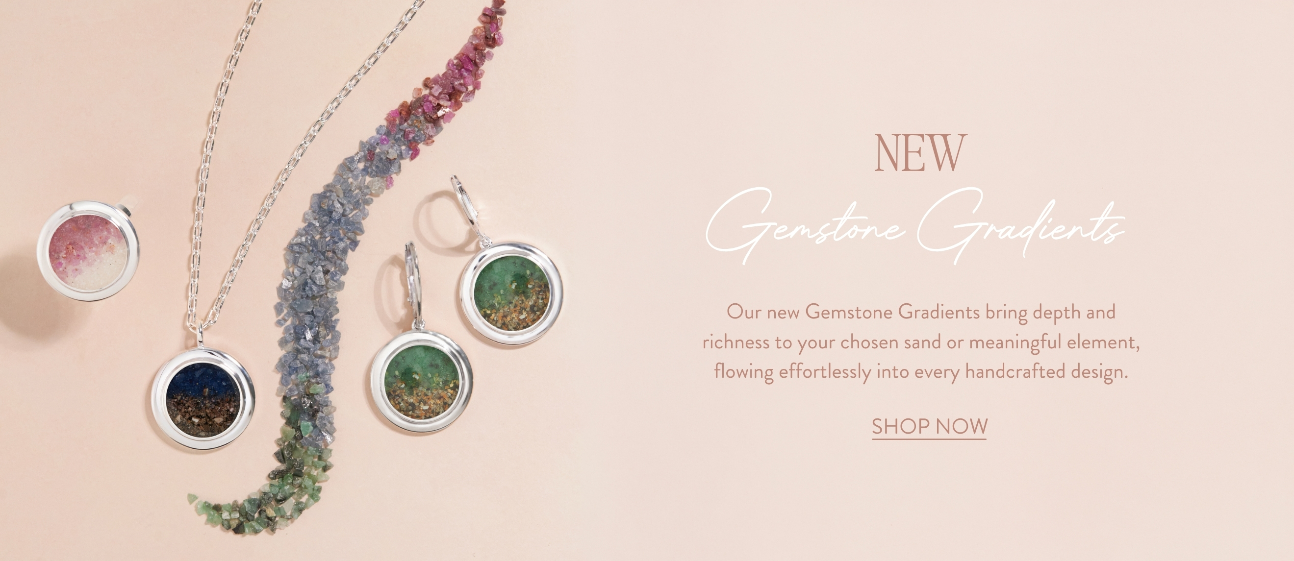 Woman wearing customizable silver stacker rings with colorful sand, birthstone and earth elements. Monthly jewelry deals and discounts.
